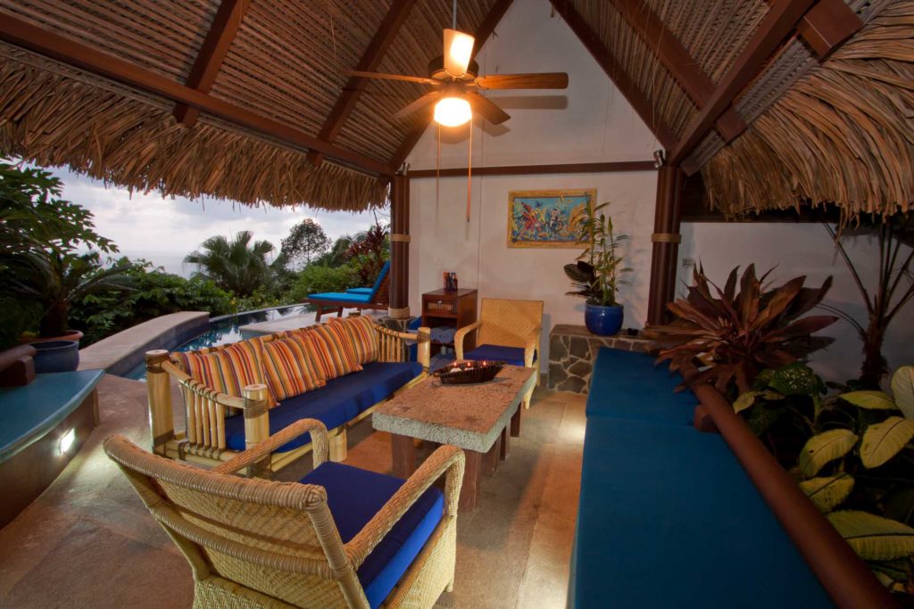 Relax with family under this handcrafted palm-covered rancho with breeze from the ocean or ceiling fan.