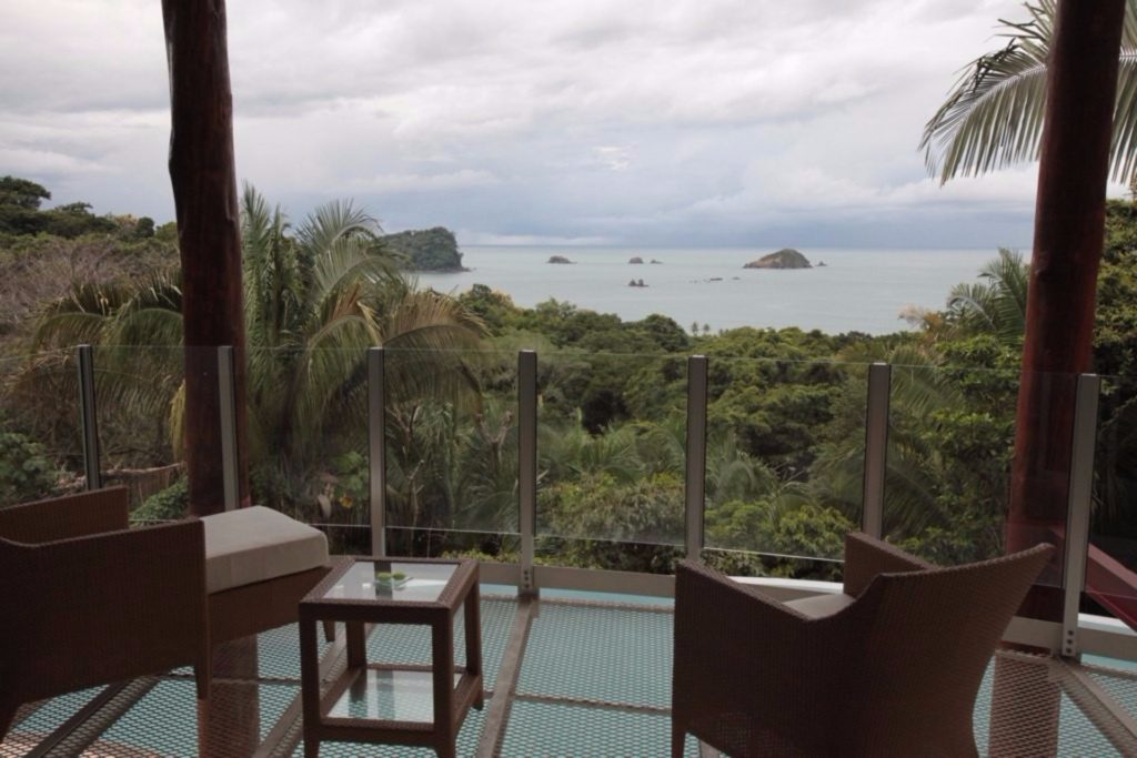 The upper-level terrace has a gorgeous view of the Manuel Antonio National Park peninsula. 