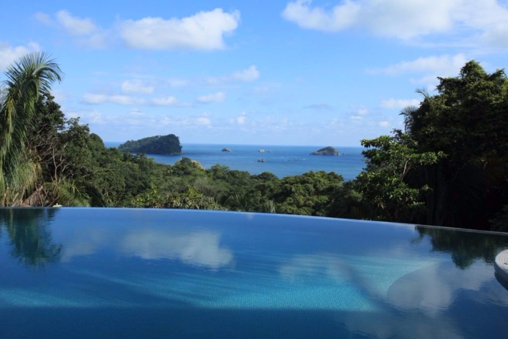 The hotel-size pool has a beautiful view of the Pacific ocean and islands that dot the Manuel Antonio coastline. 