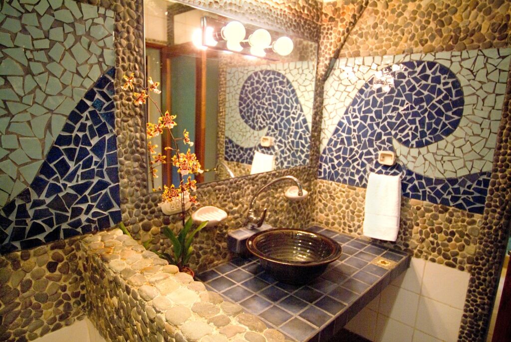 Local artistry using tile and stone was used to create luxurious designs, even in the bathrooms. 