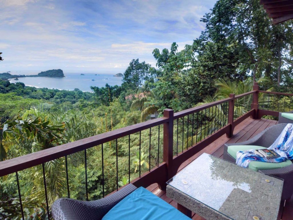 The master bedroom has a private balcony with an amazing view that brings you close to the tropical wildlife. 