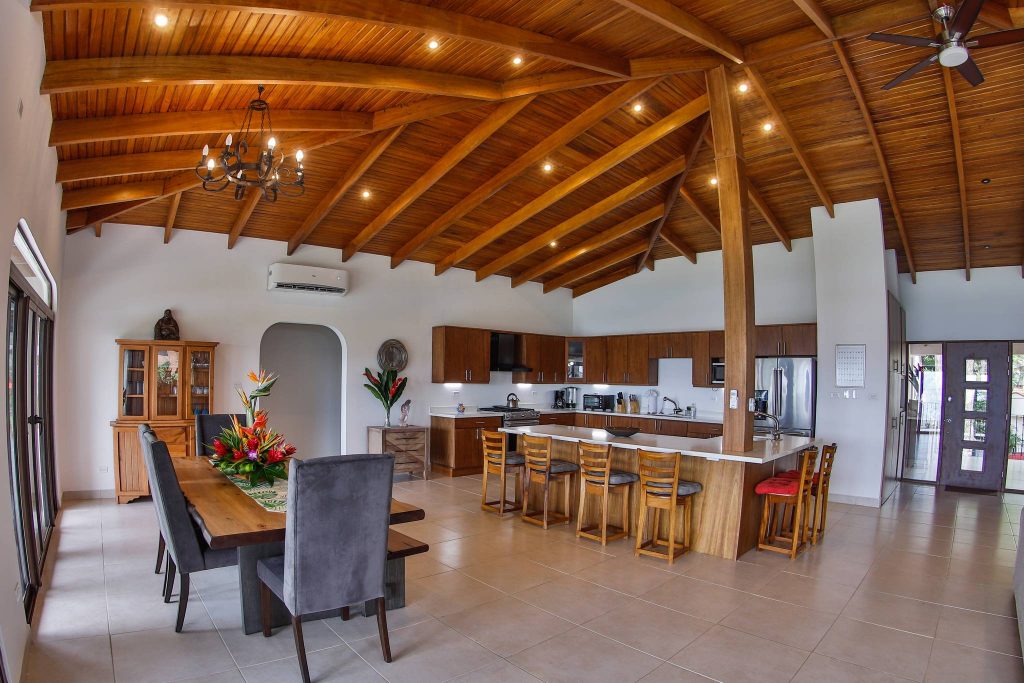 A better view of the dinning table and the kitchen together!! You will love this spectacular Villa!!