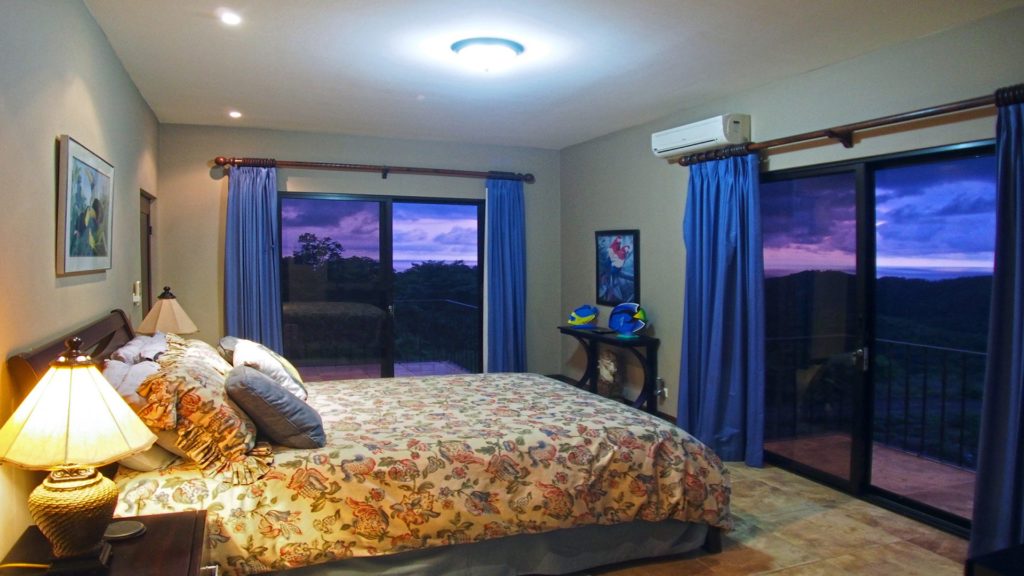 This bedroom has views for all to enjoy with plenty of space