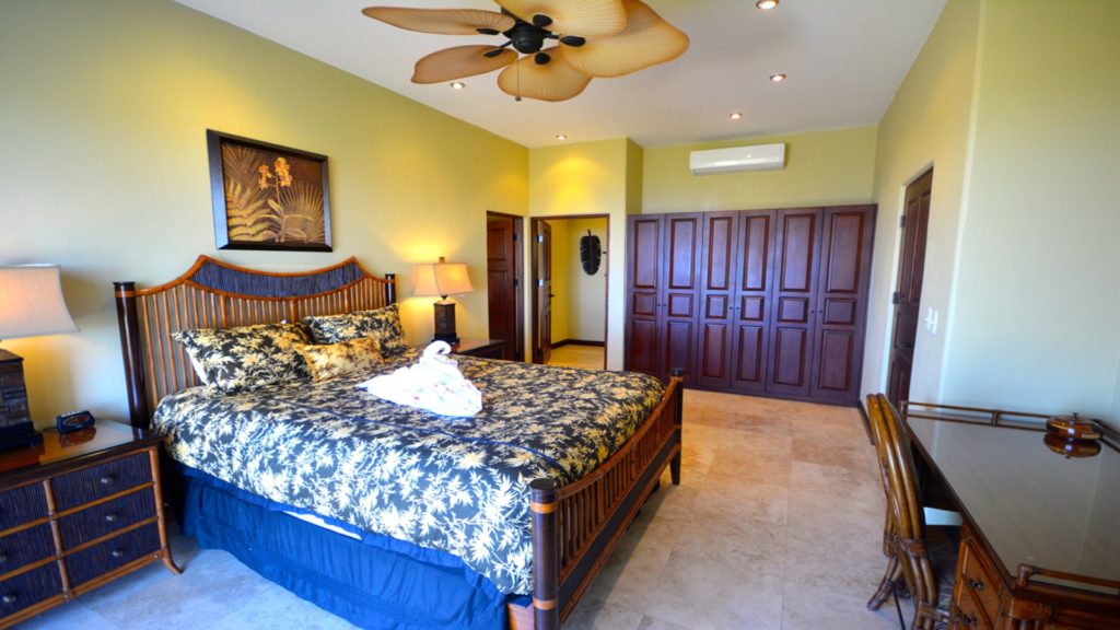 A little Rest & Relaxation is what&apos;s recommended while staying in this peaceful and luxurious bedroom. The bedroom offers a nice setting for relaxation, while cooling off under the ceiling fan