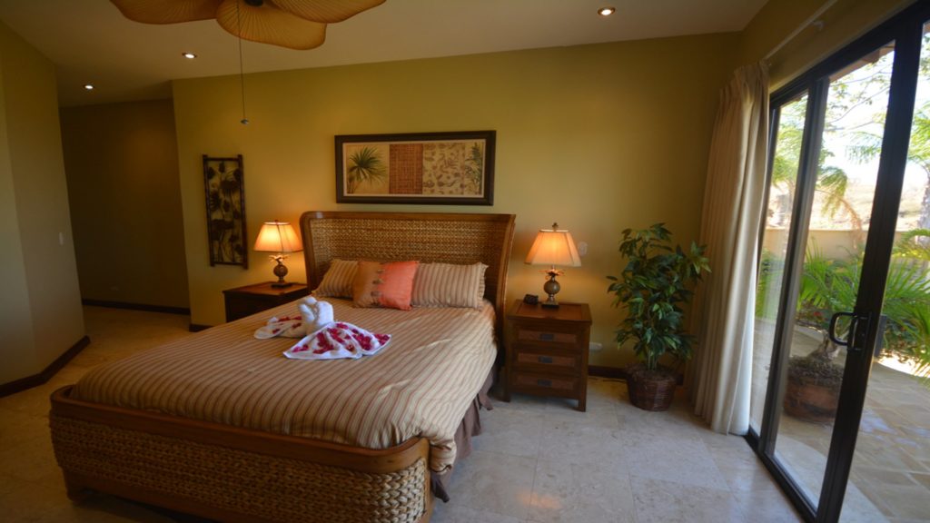 Relaxation is what you will find. This bedroom offers nice comfortable bed and stunning views