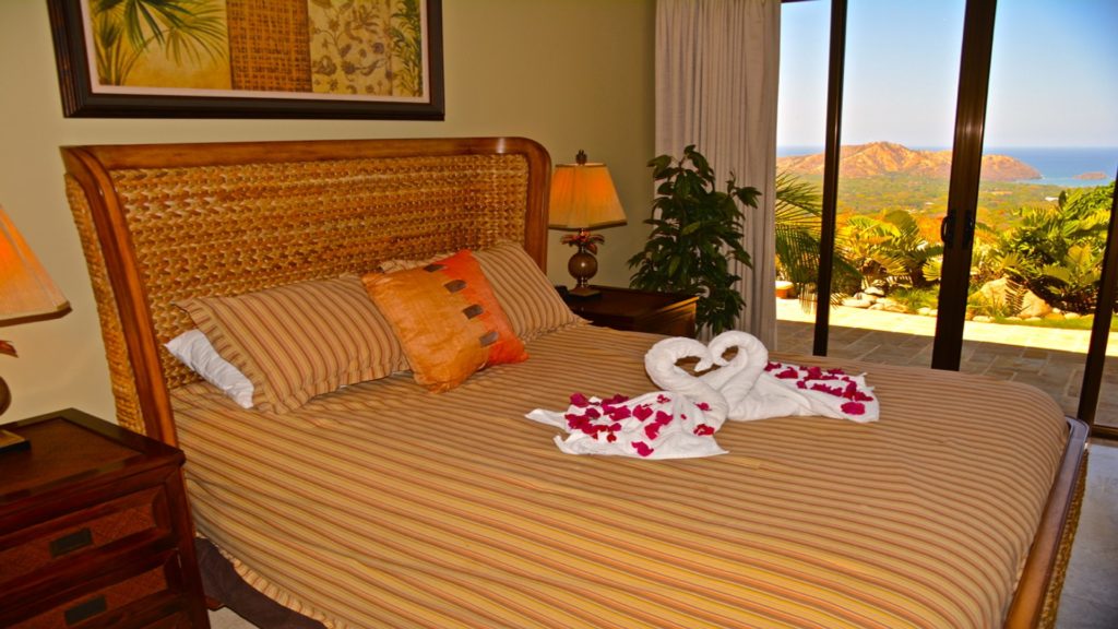 Picture yourself at this bedroom while taking in these views. The Relaxation is needed from time to time and this area offers just that with breath taking views 