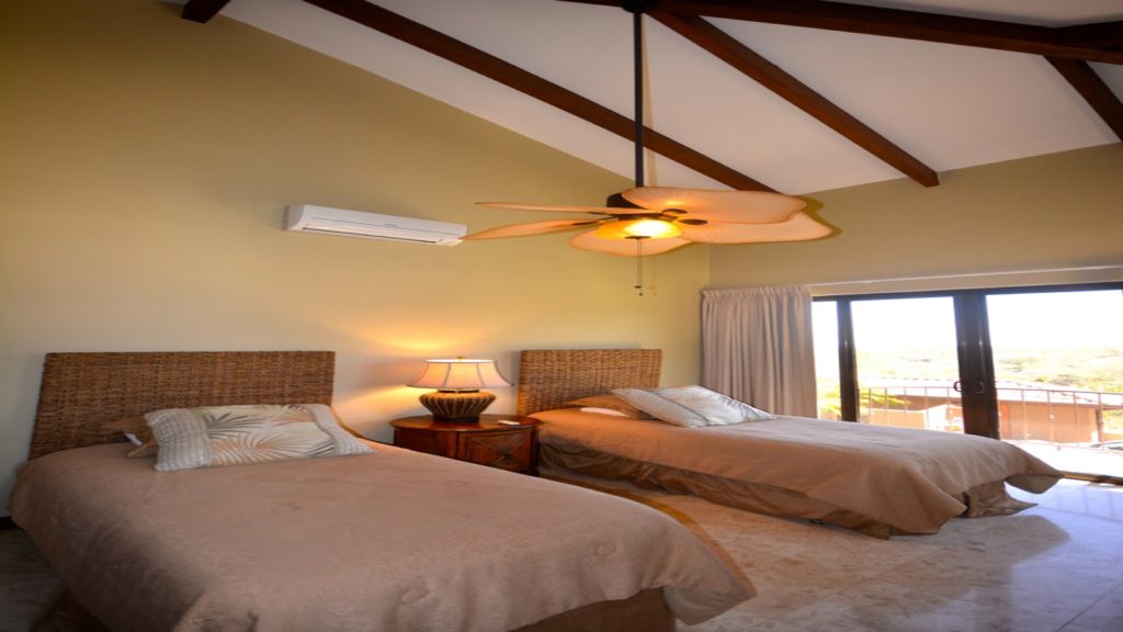 Ready to enjoy either bed? No worries you have a selection of comfort. This bedroom offers 2 nice comfortable beds and stunning views, while cooling off under the ceiling fan