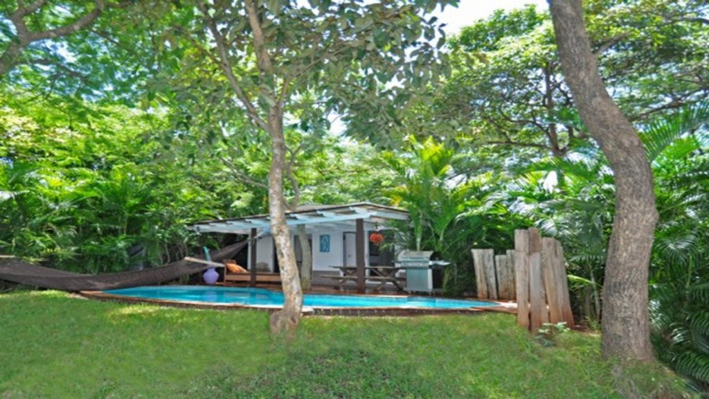 Nestled among the trees, TA-26 has a private pool and great ocean view