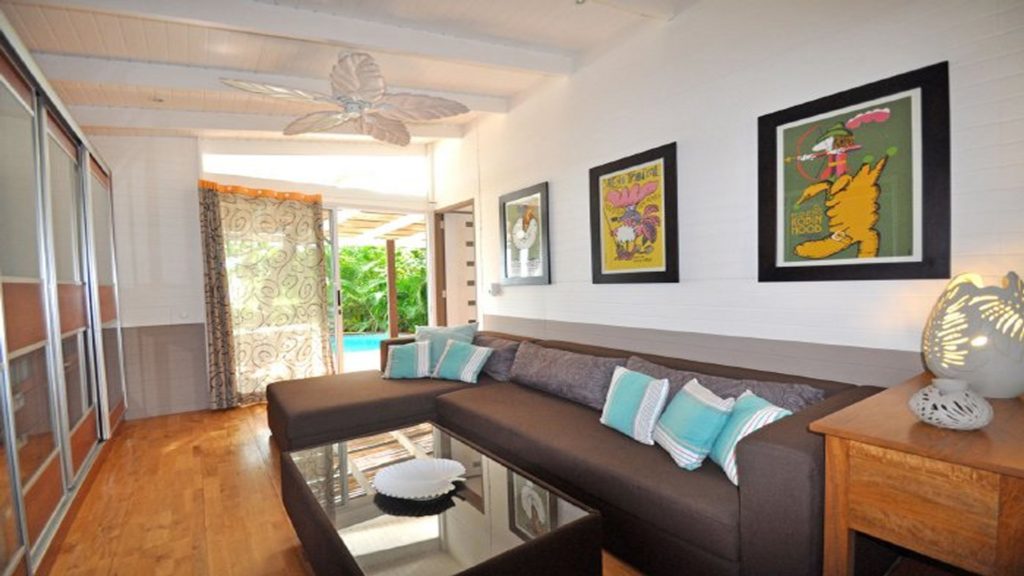 Step right out to the pool from the living room at TA-26. Enjoy all the furniture d�cor on the inside as well