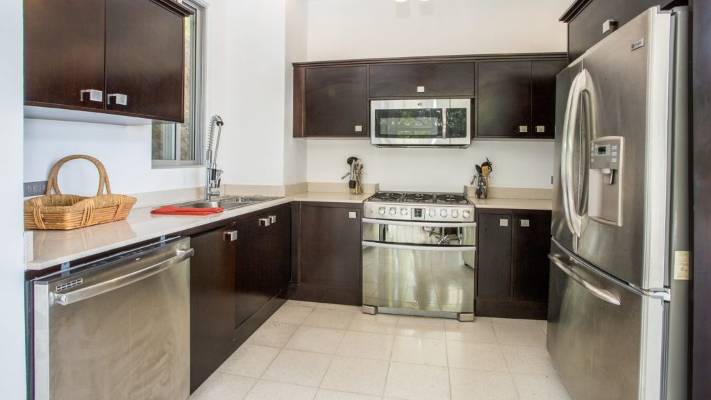 The kitchen has lots of cabinet and counter space for you or your optional private chef to prepare delicious meals.