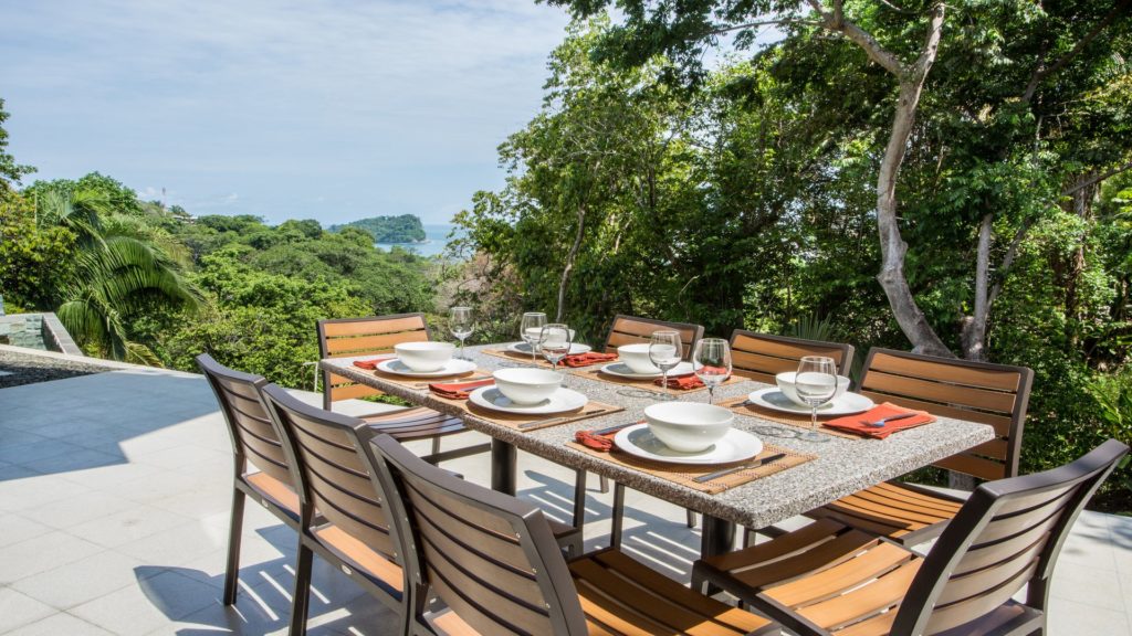 Dining al fresco on the patio at this ocean-view Manuel Antonio villa is a special treat in awesome jungle surroundings.