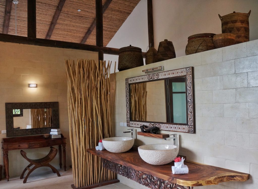 Detailed design is in every room. Hand-carved accents, bamboo, and beautiful accessories fill this bathroom.