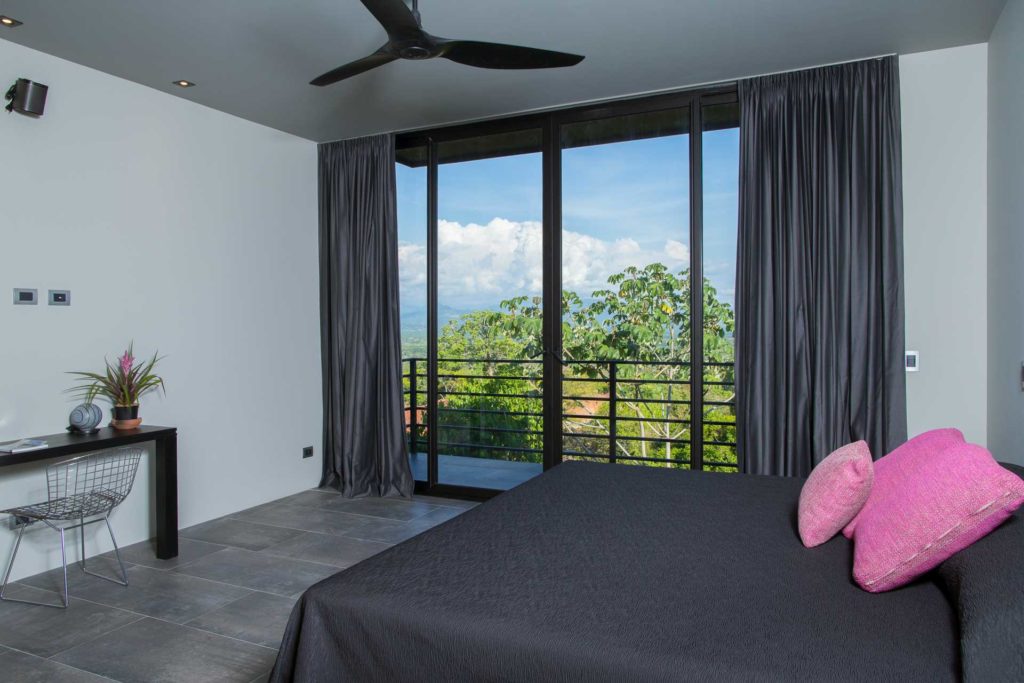 The view from this king bedroom is breathtaking. Step out onto the private balcony for an even better look.