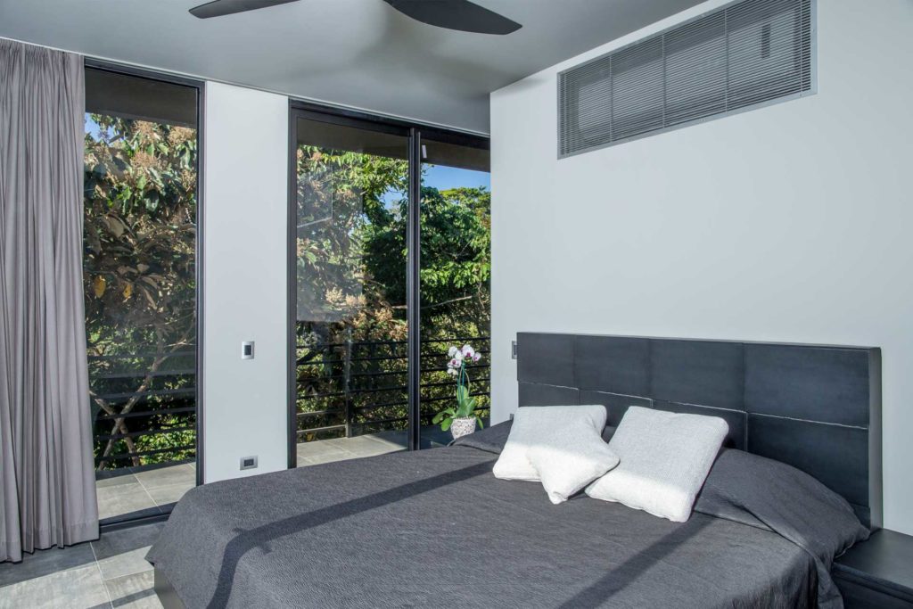 Modern furnishings contrast with the jungle setting. You may see monkeys or a sloth just outside your bedroom window.