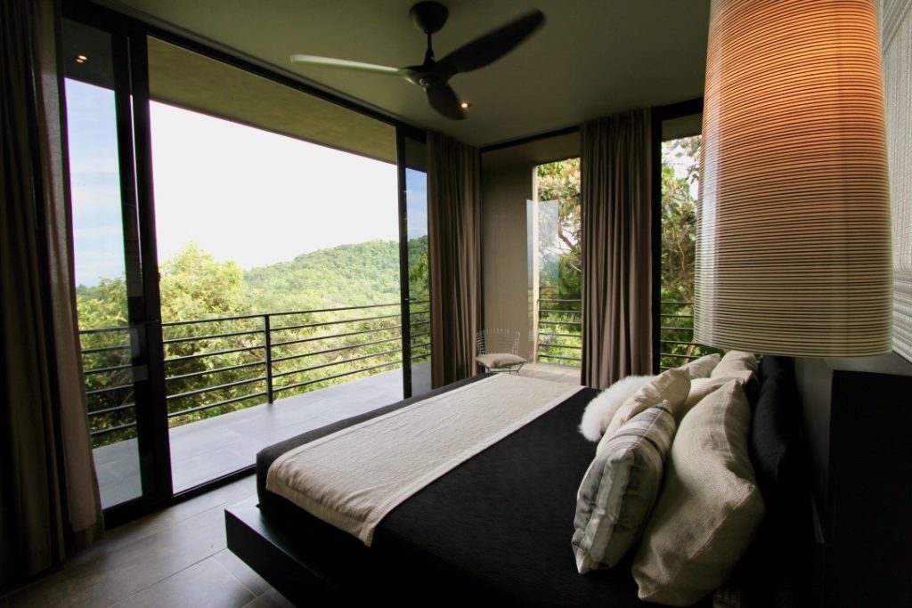 Wake up each morning in your air-conditioned bedroom to a spectacular view of the mountains, jungle, and ocean.