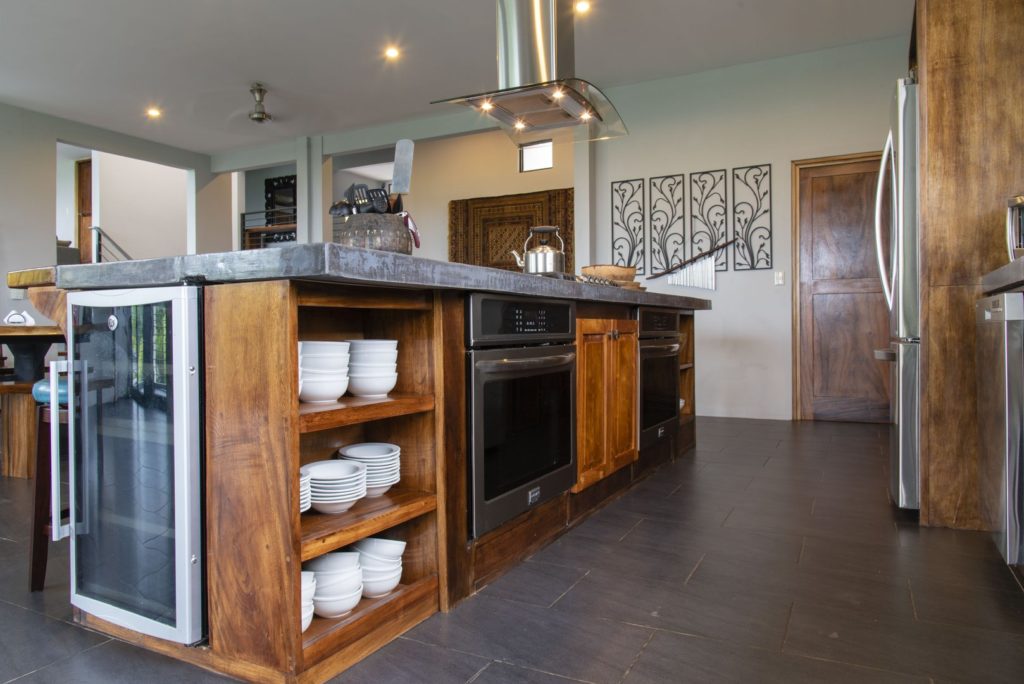 The kitchen is full of modern appliances and is fully equipped.