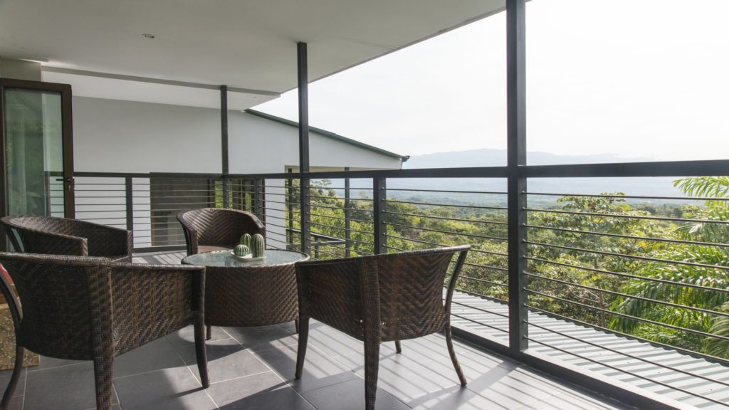Enjoy the wonderful sights and sounds of the tropical rainforest from this beautiful balcony.