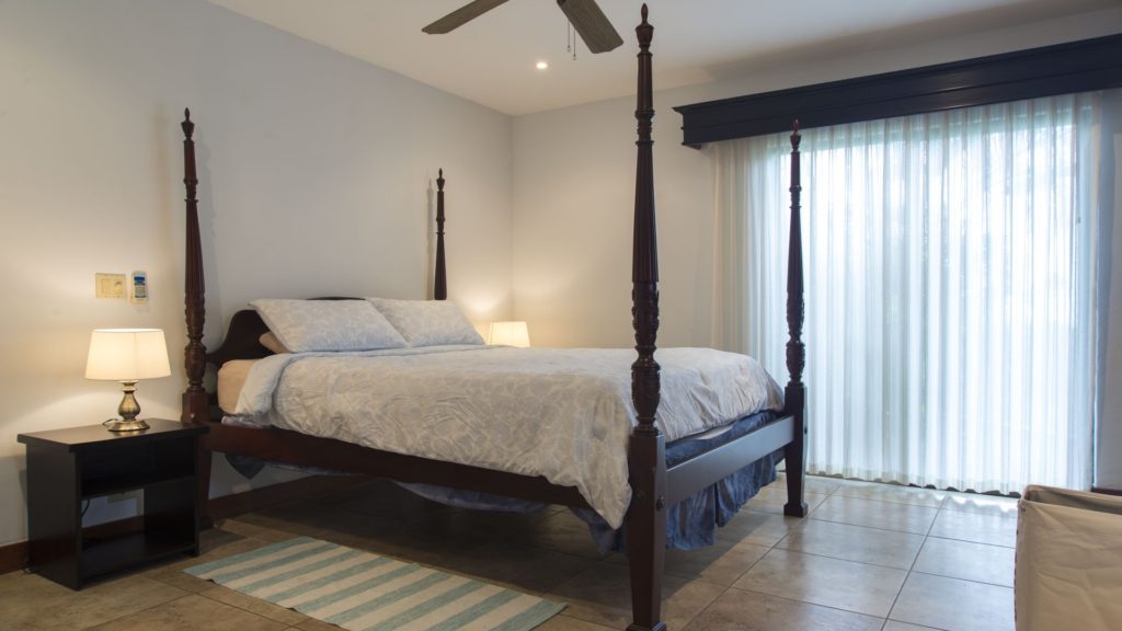 The 2 guest bedrooms at are wonderfully furnished with this one featuring a beautiful queen poster bed.