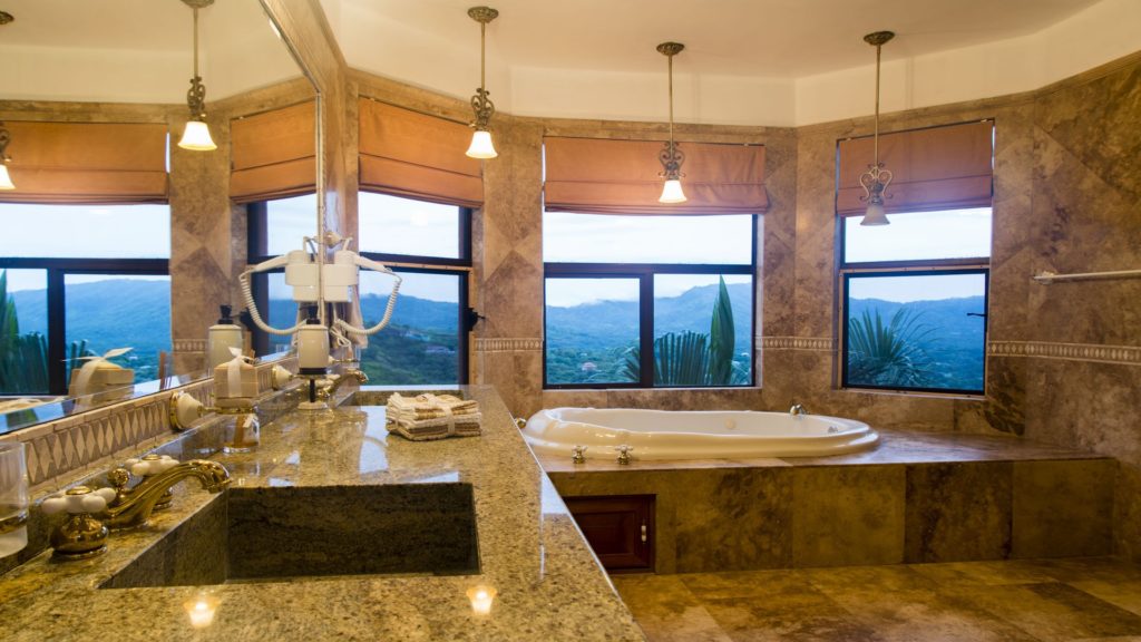 Feel like royalty when pampering yourself in the master bath while enjoying a spectacular mountain and ocean view.