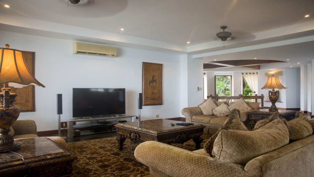 Enjoy the large screen cable TV in this luxurious living room.