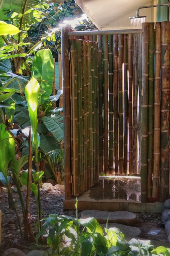 An added treat is the tropical outdoor shower by the splash pool.