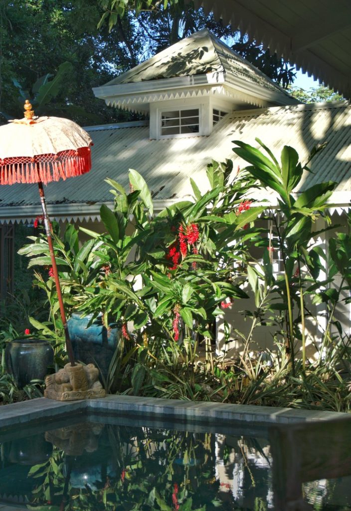The separate casita is nestled within the tropical garden behind the plunge pool. 