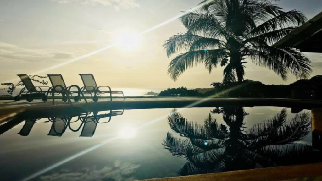 Pool just as the sun sets on the Pacific.