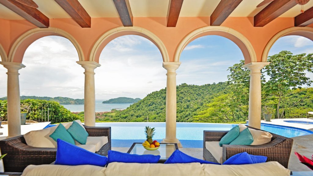 The pool area offers a front-row seat to magical views of the ocean and the lush forest.