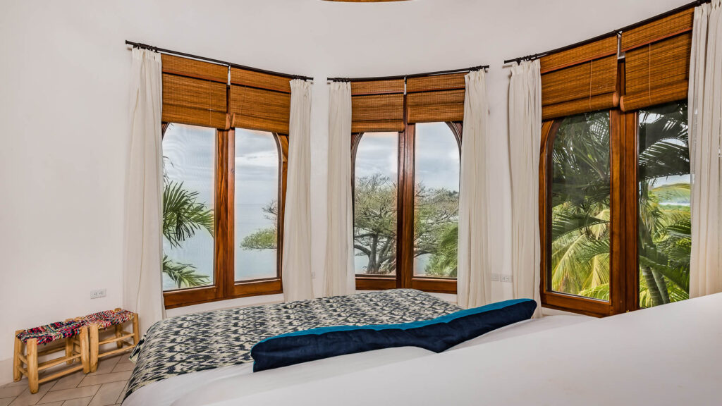 Enjoy the view from this pristine bedroom.