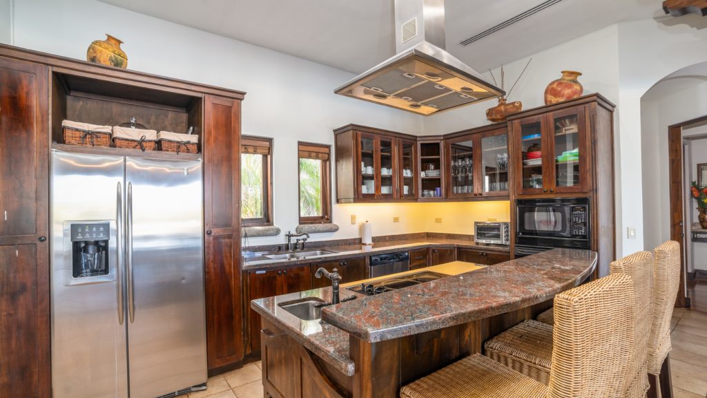 This fully equipped kitchen has all modern appliances.