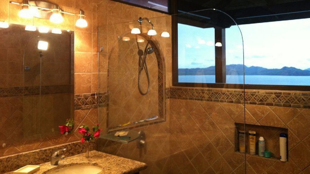 Even from the master bath shower you can enjoy looking out over the water.