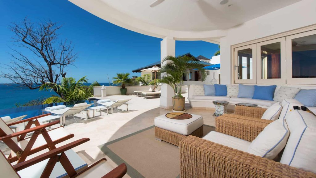 Choose one of the many comfortable seats on this large veranda and take in the impeccable view.