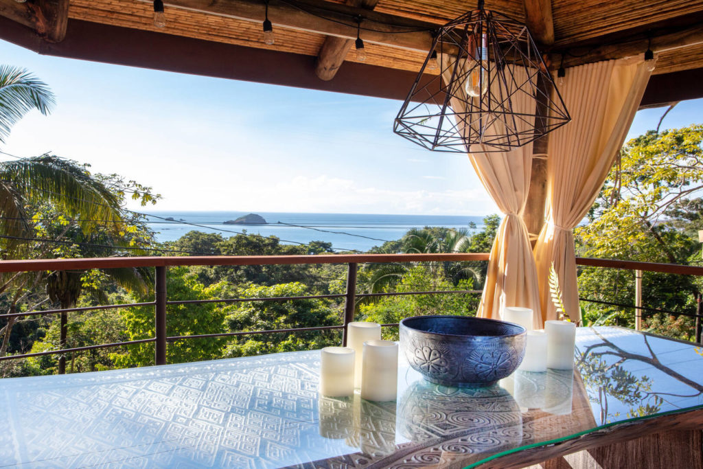 Like everywhere else in this stunning villa, the dining area has a gorgeous ocean view.