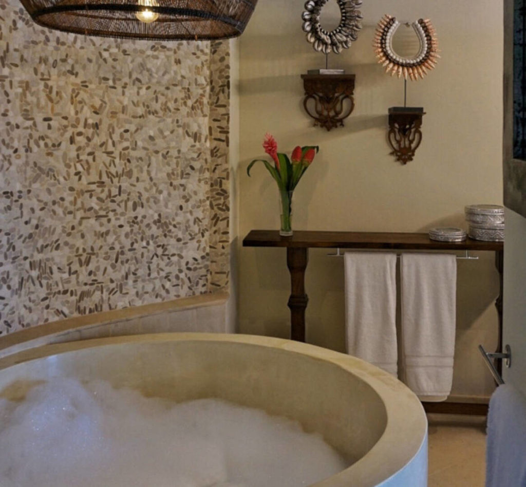 Soak in your luxury stone tub after a day exploring Manuel Antonio National Park.