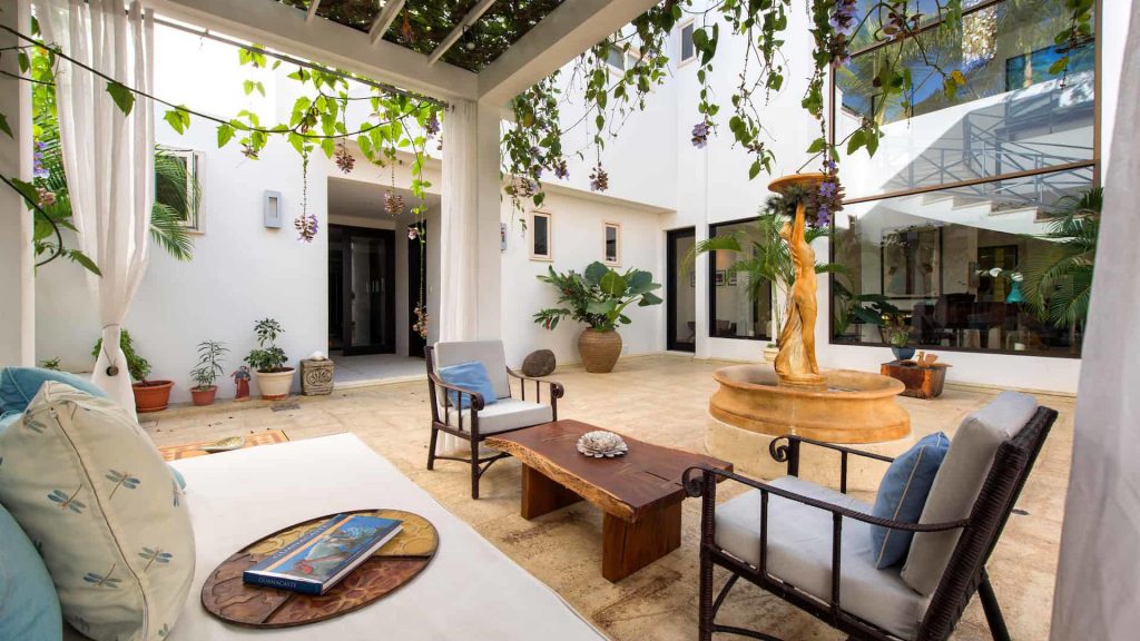 This gorgeous courtyard has many cool features including the center piece water fountain. 