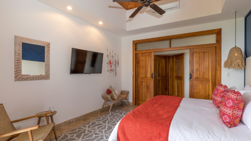 The bedrooms all have air conditioning, a ceiling fan, and can be opened up to ocean breezes.