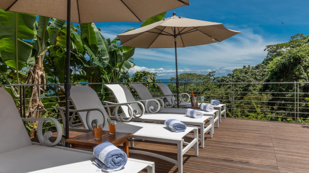 The sun deck has comfortable loungers for sunbathing after taking a dip in the large pool.