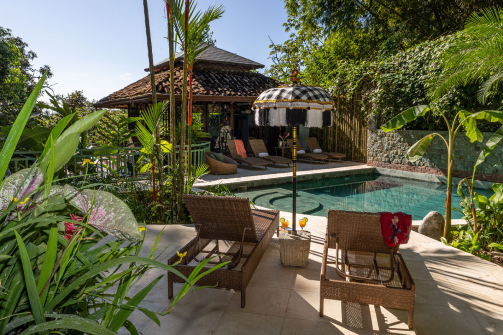 Kick back in the deluxe poolside lounge, surrounded by exotic gardens.
