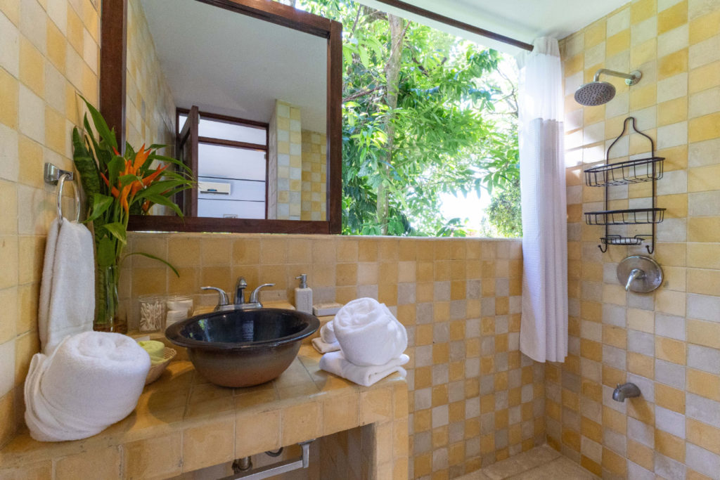 The bathroom's natural design radiates a relaxing atmosphere.