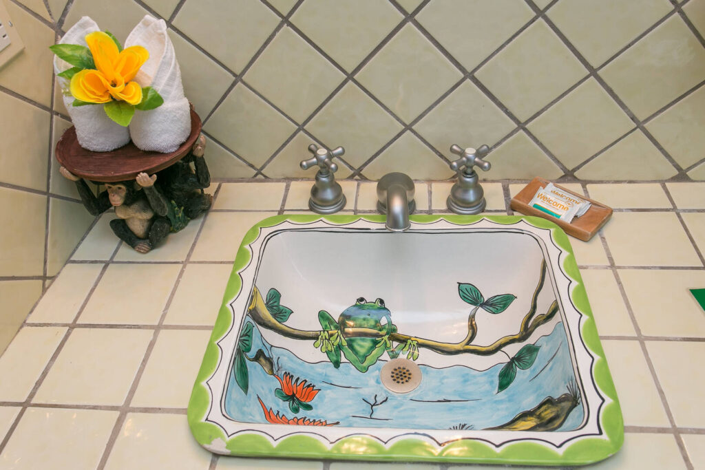 This hand-painted sink is a charming fun feature.