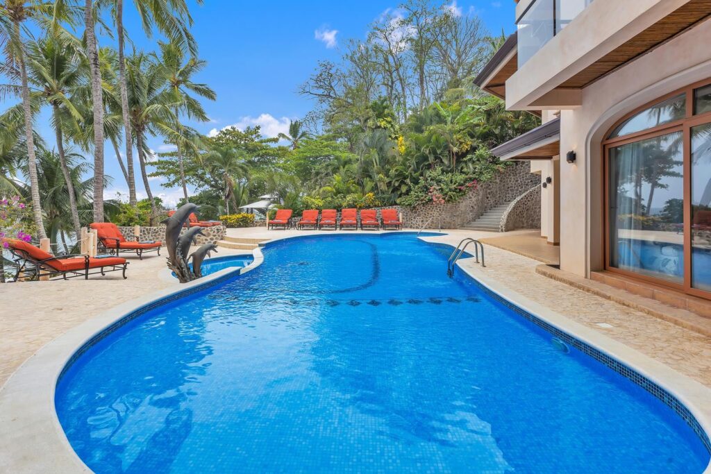 Spend the day beside the private beachfront pool surrounded by tropical gardens, just steps from the peaceful shores of Playa Tambor.