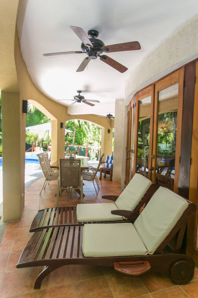 There are comfortable loungers to enjoy a nap in the shade or out by the pool.