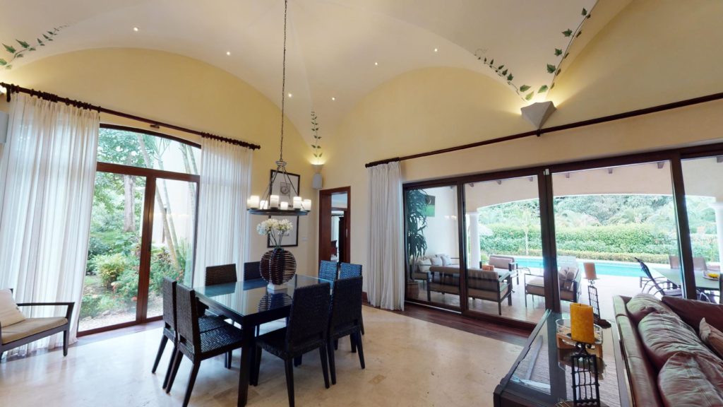 The vaulted ceilings and beautiful lighting add elegance to the dining area.