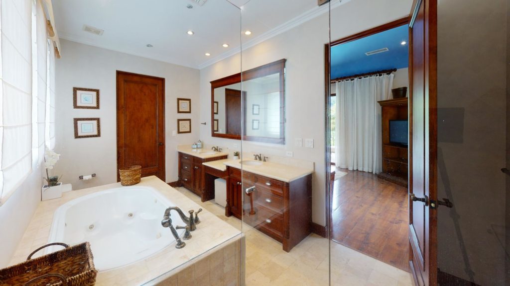 This bathroom exudes timeless charm with its classic and elegant bathtub.
