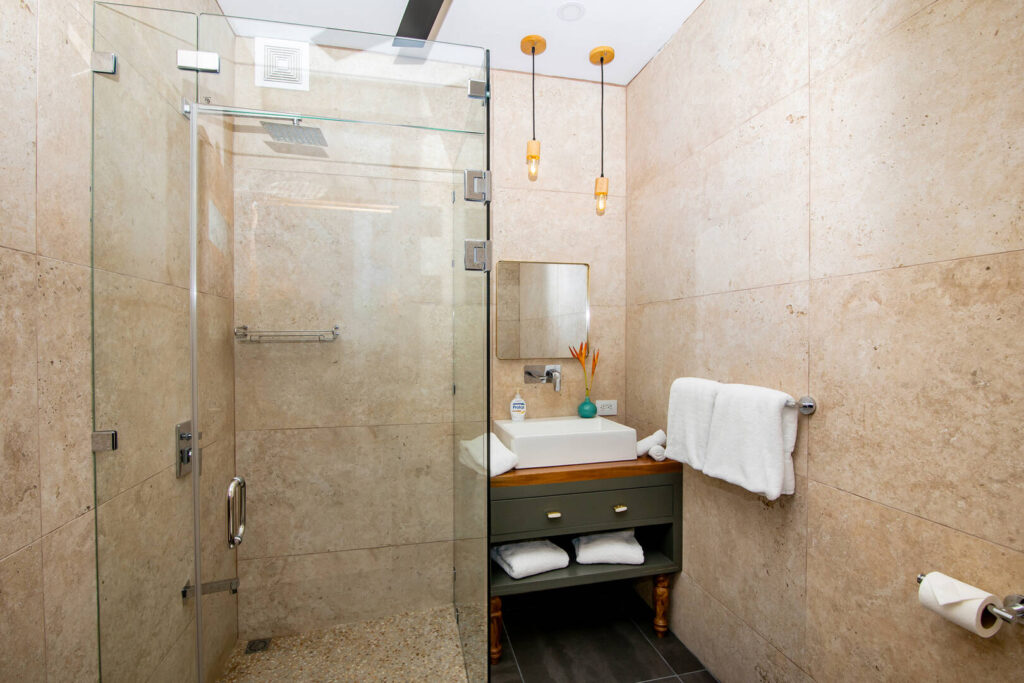 The clean natural design and decor of this bathroom has a truly relaxing vibe.