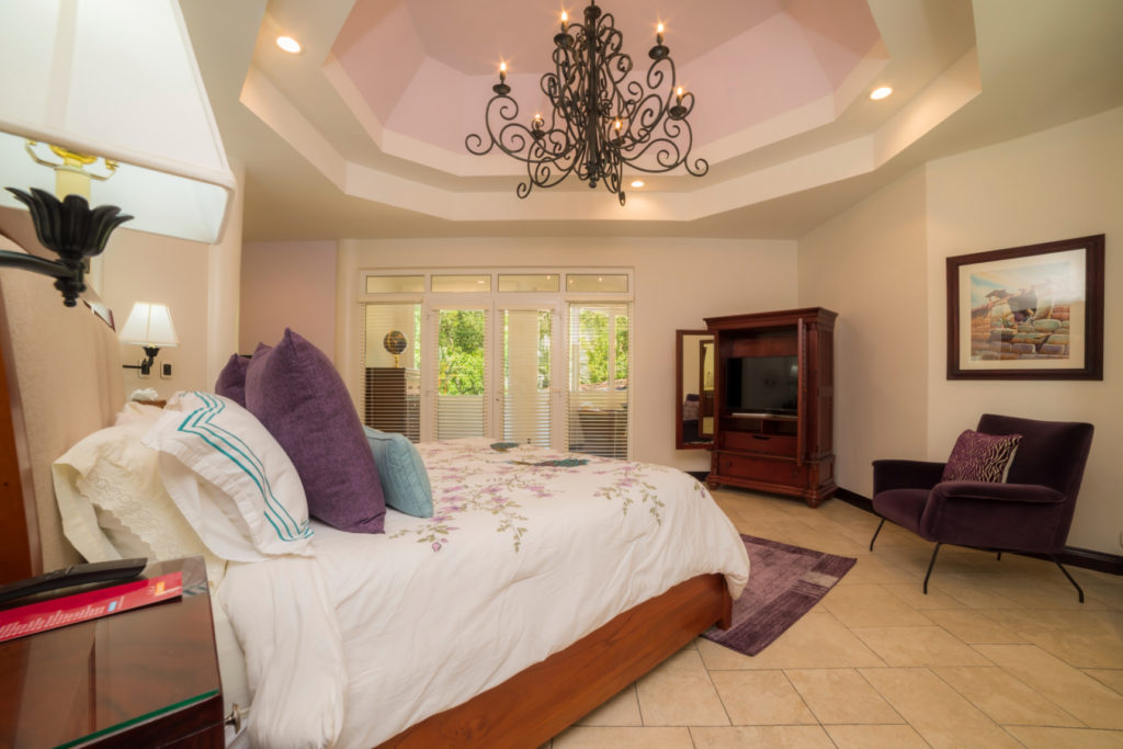 Luxury meets nature's beauty in this bedroom for a truly tranquil retreat. 