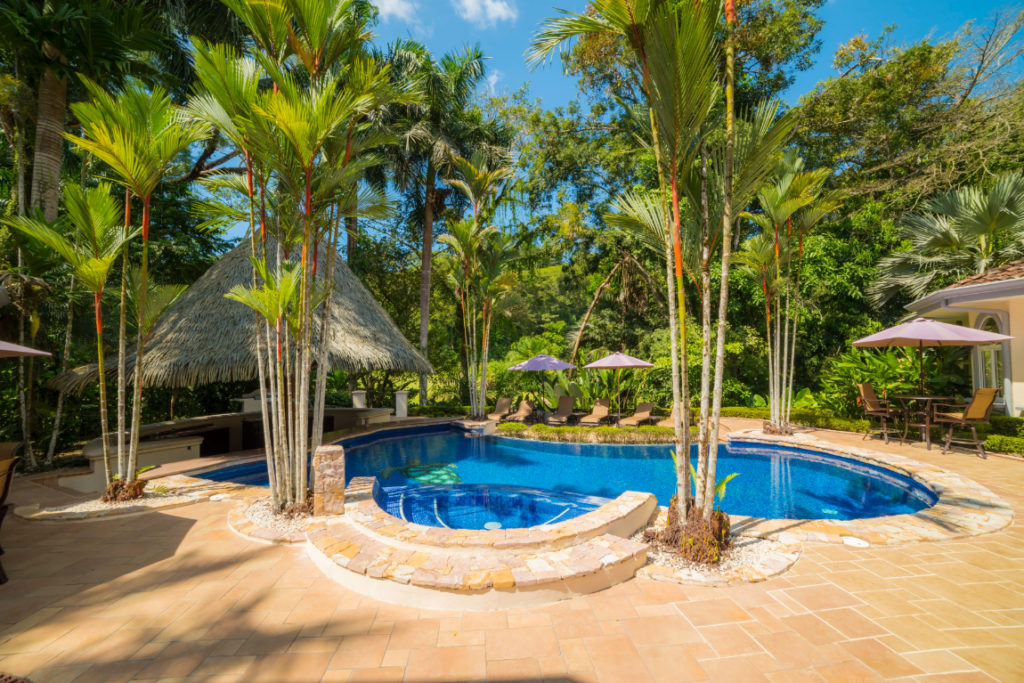 Your private poolside sanctuary, where a day of basking in the sun, and sipping exotic beverages, is complemented by the serenity of lush tropical surroundings.