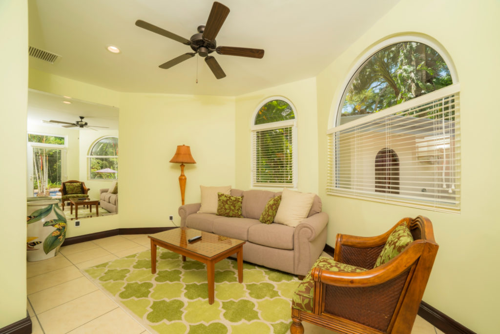 Experience tropical serenity in this elegantly cozy space and a tranquil garden view, inviting you to unwind in style. 