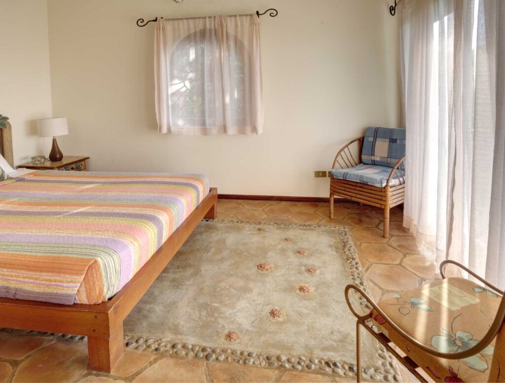 A sunlit guest suite with simple elegance and cozy comfort, just steps from nature.