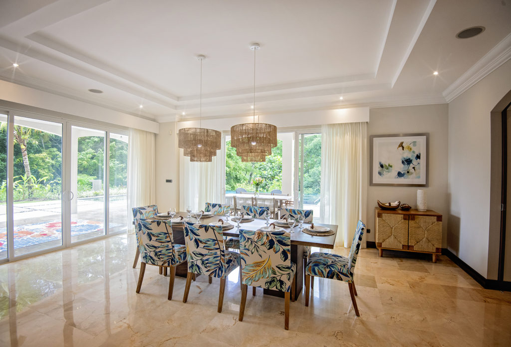 Refined dining: Elegant furniture and natural light enhance the allure of our dining room.